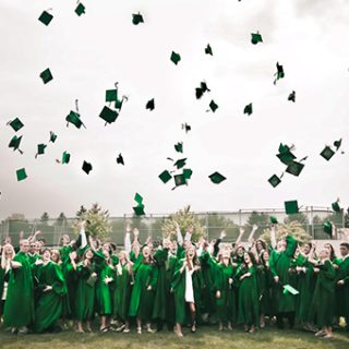 Students Tossing Hats at Graduation