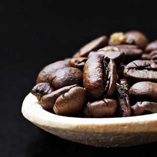 Wooden Spoon With Coffee Beans